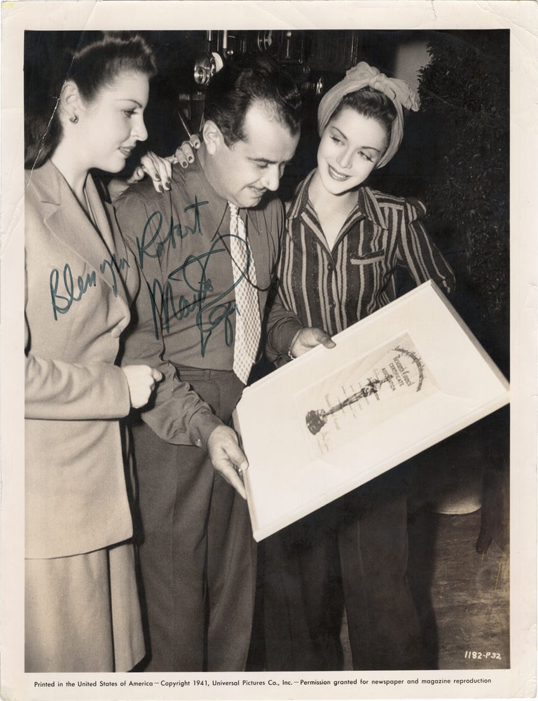 Book #165579] Original publicity photograph of Joseph Valentine with Martha Raye and Carol Bruce,...