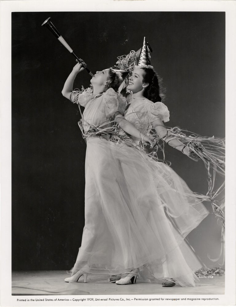 Two original publicity photographs of Anne Nagel and Peggy Moran