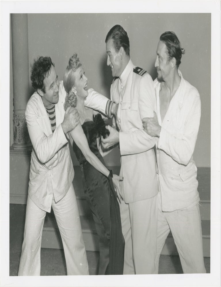 Seven Sinners (Two original photographs of Marlene Dietrich, John Wayne, and others on the set of...