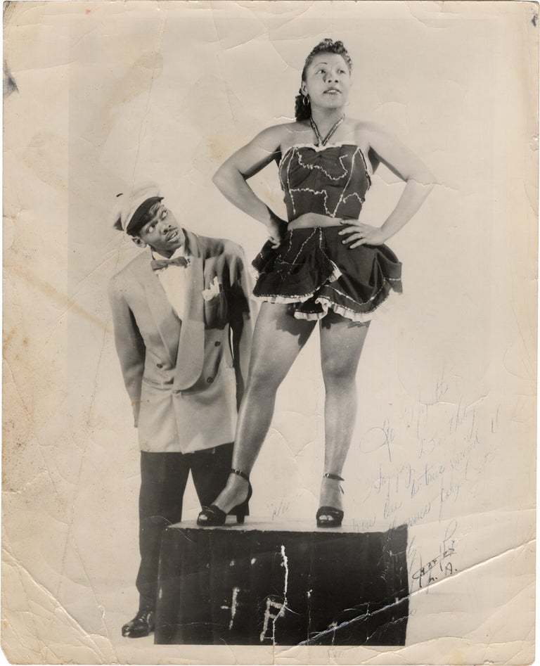 Archive of nearly 150 photographs of jazz, blues, and popular music performers, including 50 INSCRIBED photographs, as well as a handful of personal photographs, belonging to jazz drummer and bandleader "Monk" McFay, circa 1930s through 1950s