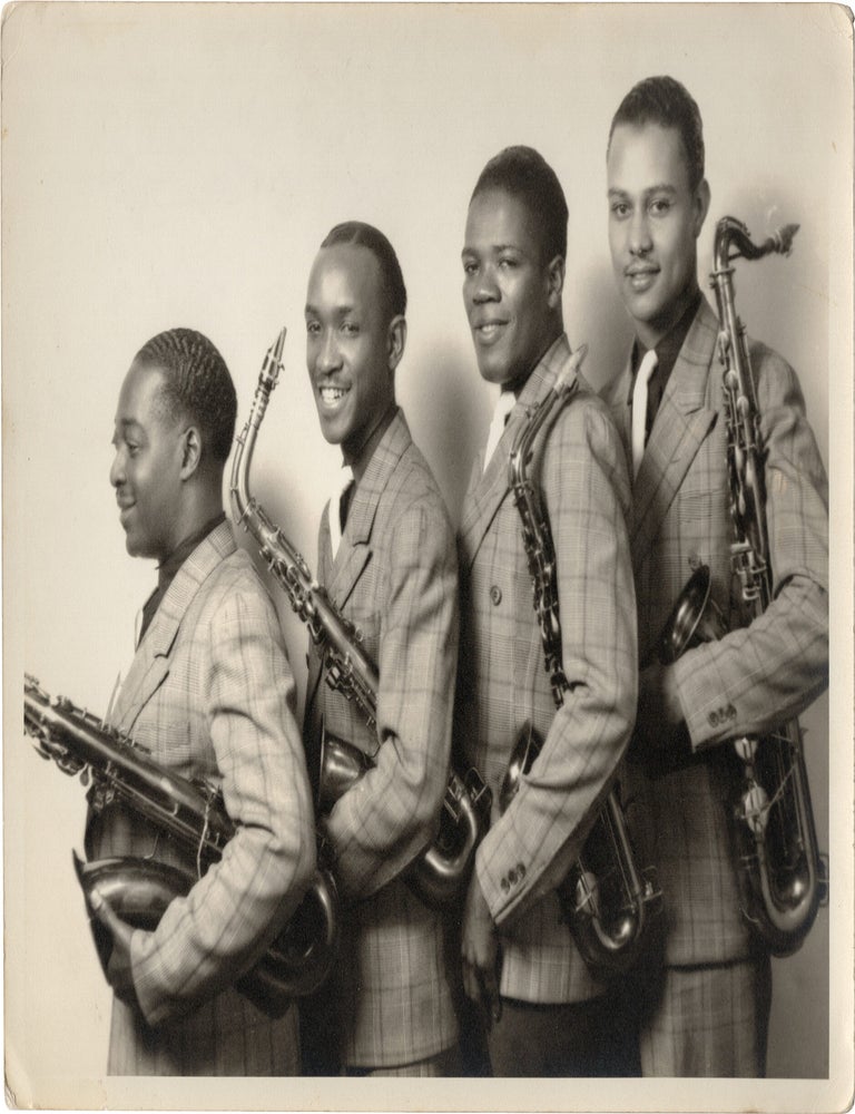 Archive of nearly 150 photographs of jazz, blues, and popular music performers, including 50 INSCRIBED photographs, as well as a handful of personal photographs, belonging to jazz drummer and bandleader "Monk" McFay, circa 1930s through 1950s