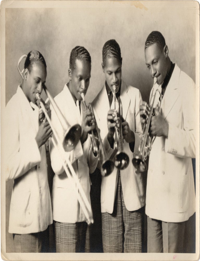 Archive of nearly 150 photographs of jazz, blues, and popular music performers, including 50 INSCRIBED photographs, as well as a handful of personal photographs, belonging to jazz drummer and bandleader "Monk" McFay, circa 1930s through 1950s