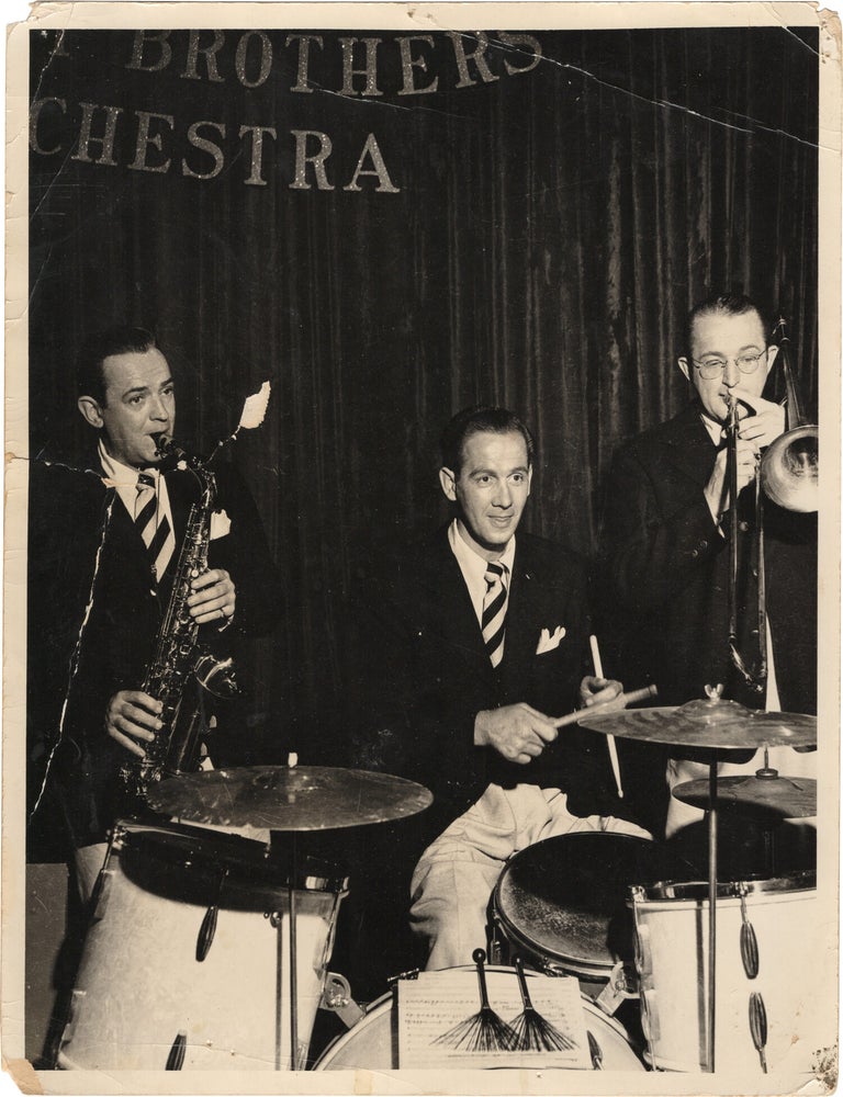 Archive of nearly 150 photographs of jazz, blues, and popular music performers, including 50 INSCRIBED photographs, as well as a handful of personal photographs, belonging to jazz drummer and bandleader "Monk" McFay, circa 1930s through 1950s