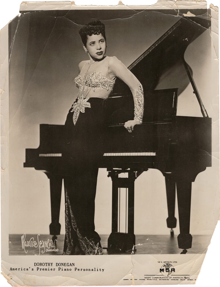 Archive of nearly 150 photographs of jazz, blues, and popular music performers, including 50 INSCRIBED photographs, as well as a handful of personal photographs, belonging to jazz drummer and bandleader "Monk" McFay, circa 1930s through 1950s