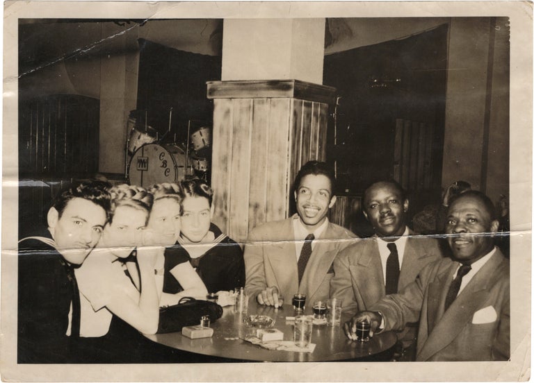 Archive of nearly 150 photographs of jazz, blues, and popular music performers, including 50 INSCRIBED photographs, as well as a handful of personal photographs, belonging to jazz drummer and bandleader "Monk" McFay, circa 1930s through 1950s