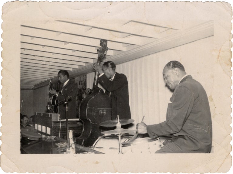 Archive of nearly 150 photographs of jazz, blues, and popular music performers, including 50 INSCRIBED photographs, as well as a handful of personal photographs, belonging to jazz drummer and bandleader "Monk" McFay, circa 1930s through 1950s