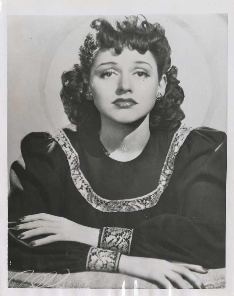 Nine original photographs of Anita O'Day, circa 1950s-1970s