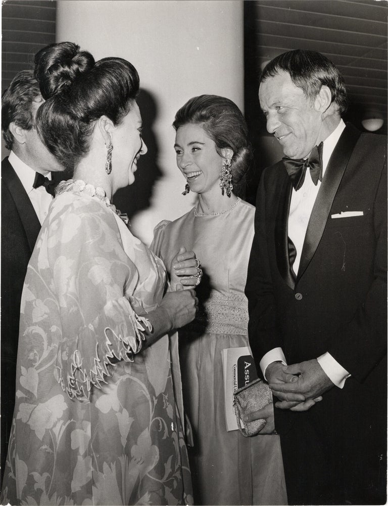Book #171468] Original press photograph of Frank Sinatra meeting Princess Margaret, 1970....
