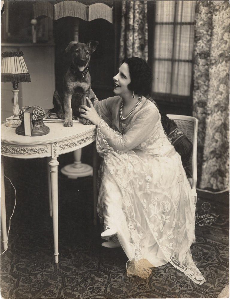 Book #171473] Original publicity photograph of Geraldine Farrar at home, circa 1917. Geraldine...