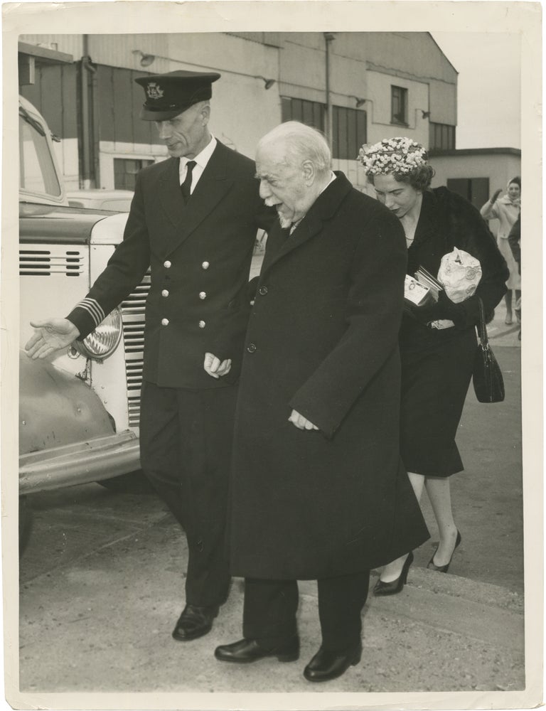 Book #171666] Original photograph of Thomas Beecham and his wife arriving in the UK, circa 1960....