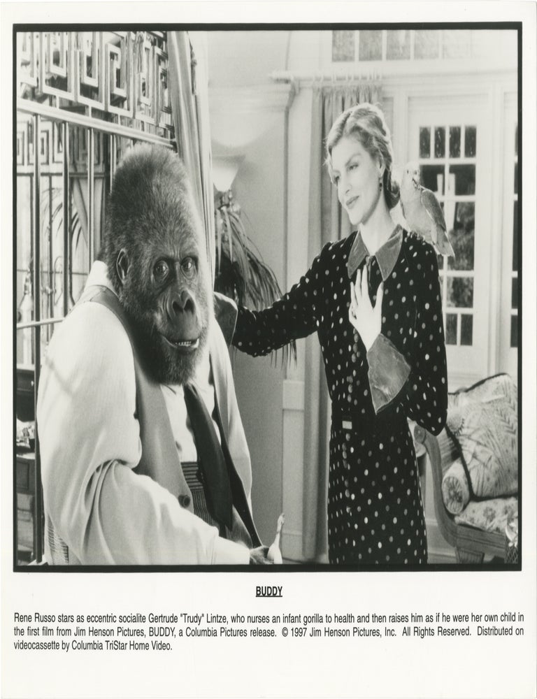 Book #171673] Buddy (Two original photographs from the 1997 film). Alan Cumming Rene Russo,...